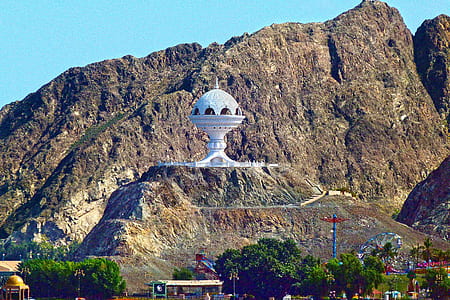 white mosque on top of hill thumbnail