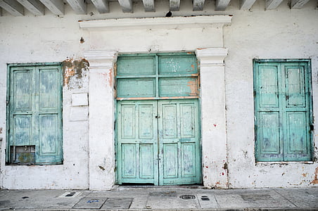 photo of blue door with white wall thumbnail