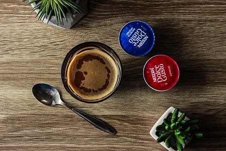 class cup near stainless steel spoon thumbnail