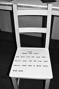 white wooden chair with print thumbnail