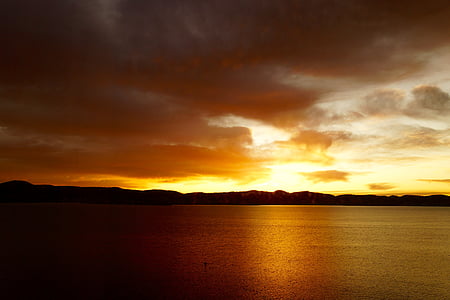 panoramic photography of horizon during golden hour thumbnail