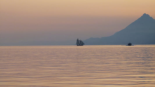 white sailboat at sea thumbnail