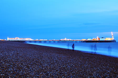 person standing near body of water thumbnail