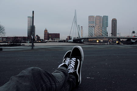 person wearing Vans Oldskool sneakers thumbnail