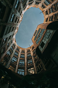 Low-angle Photography of Brown Concrete Building thumbnail