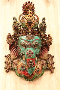 teal and red Ganeisha figurine thumbnail