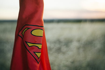 selective focus photography of red Superman coat thumbnail