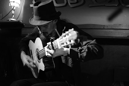 man playing guitar photo thumbnail
