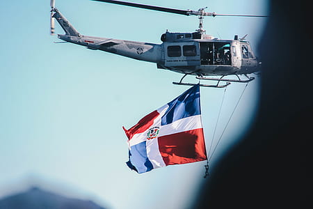 grey utility helicopter flying thumbnail