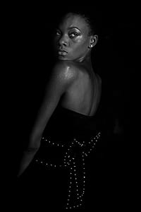 grayscale photography of woman in strapless top thumbnail