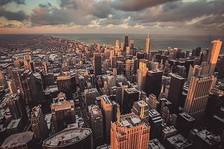aerial photo of high-rise buildings during golden hour thumbnail