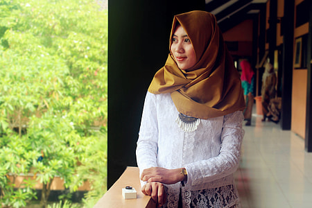 woman in white long-sleeved top thumbnail