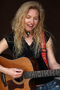 woman playing guitar thumbnail