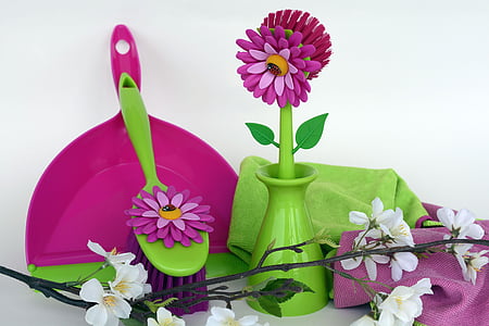 purple plastic dust pan near green and pink flower figurine thumbnail