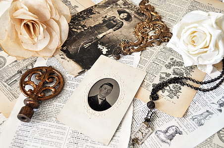 assorted accessories and papers on table thumbnail