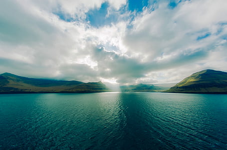 photography of calm sea during daytime thumbnail