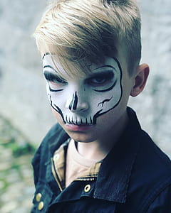 boy wearing skull makeup thumbnail