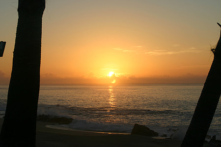 body of water and sunset thumbnail