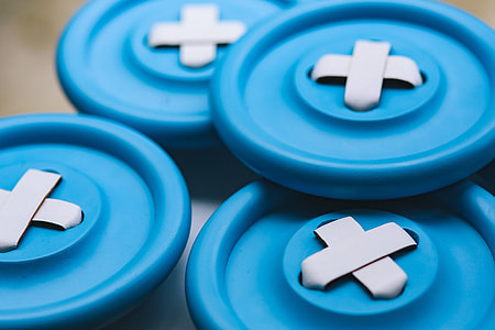 Close-ups of big blue plastic buttons thumbnail