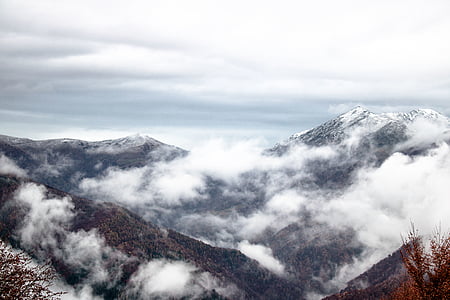 mountain under cloudy sky during daytime thumbnail