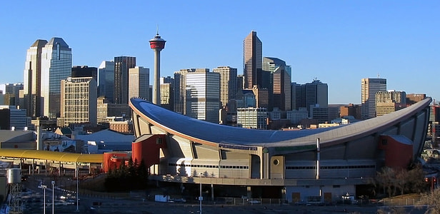 The Saddledome and the Skyline with towers in Calgary, Alberta, Canada thumbnail