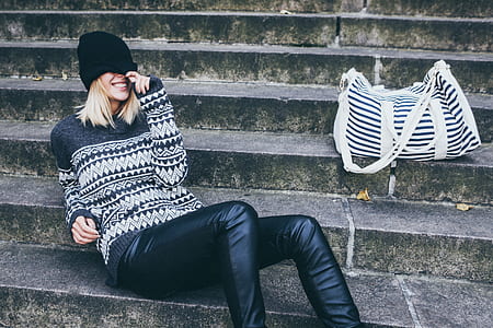 woman sitting on concrete stair thumbnail