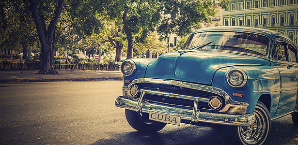 shallow focus photography of blue mini cooper coupe thumbnail