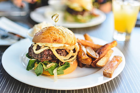 burger and fries on white ceramic plate thumbnail