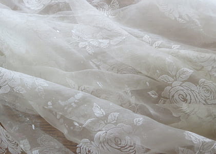white lace textile thumbnail