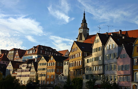 colored buildings under white cloudy sky thumbnail