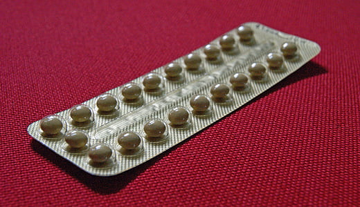 brown medication blister pad on red pad thumbnail