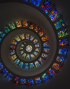 bottom-view of spiral ceiling with stain glass windows thumbnail