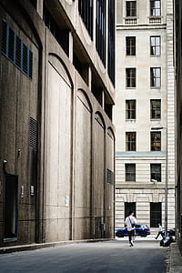 man walking towards street thumbnail