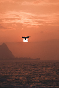 black quadcopter under ocean thumbnail