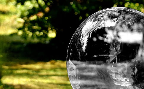 selective focus photography of glass sphere thumbnail