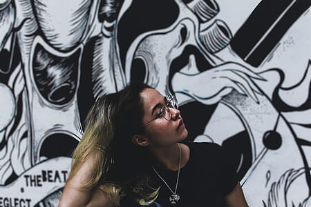 woman touching own hair thumbnail