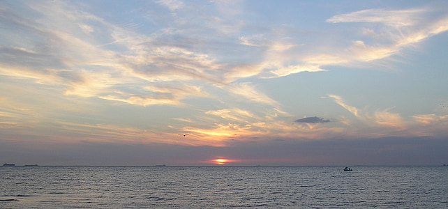 sea under blue sky thumbnail