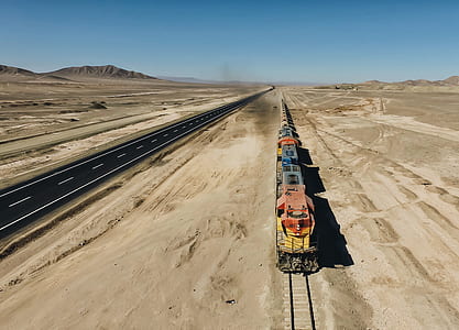 aerial view of red and blue train thumbnail