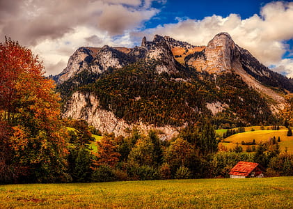 landscape photography of house near mountain thumbnail