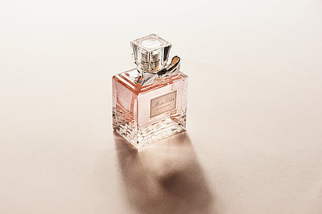 clear perfume bottle on white surface thumbnail