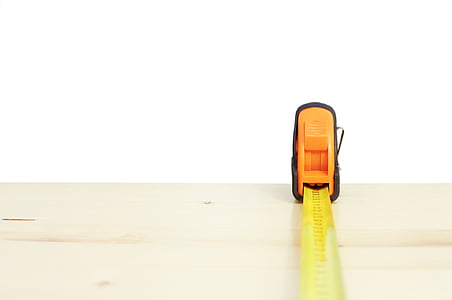 orange and black measuring tape in macro photography thumbnail