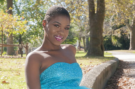 Woman Wearing Blue Strapless Top thumbnail