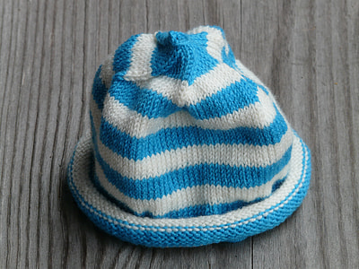 white and blue striped knit cap thumbnail