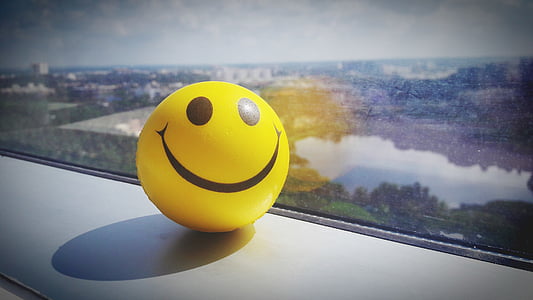 yellow emoji ball on focus photography thumbnail