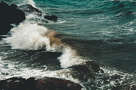ocean waves taken during daytime thumbnail