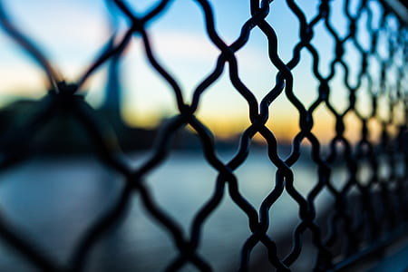 Close Photography and Tilt Lens of Black Chain Link Fence thumbnail