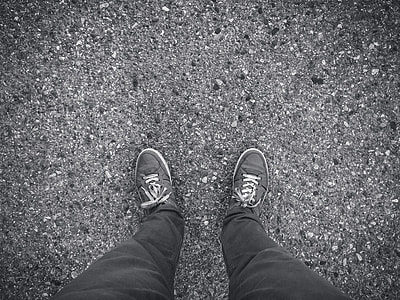 person in black-and-white lace-up shoes thumbnail