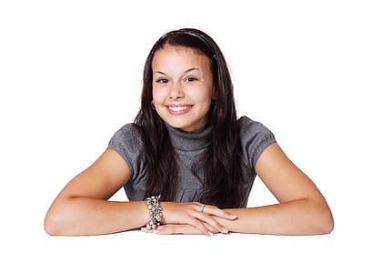 Smiling Brunette Girl in Gray thumbnail