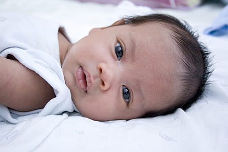 baby wearing white shirt thumbnail