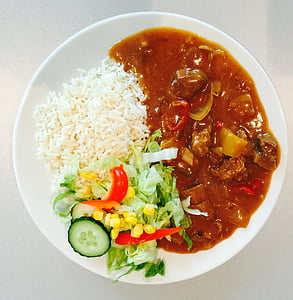 plate of cooked food with salad and steamed rice thumbnail